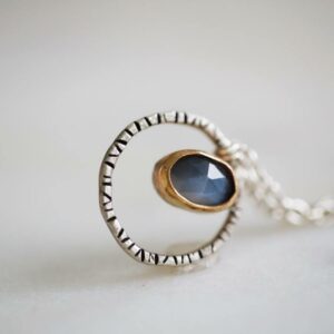 gold and silver moonstone pendant